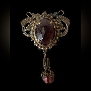 Antique-Style Gold Brooch with Faceted Purple Colored Stone and Tassel